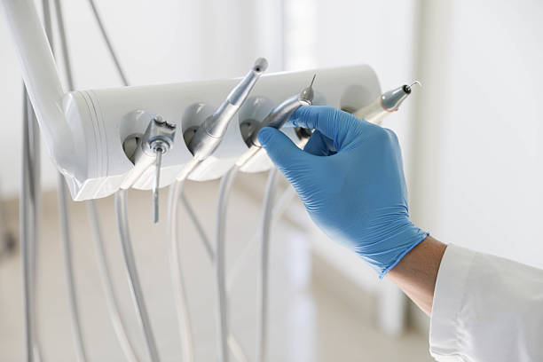 Professional Tooth Extraction technician working in Holley, NY